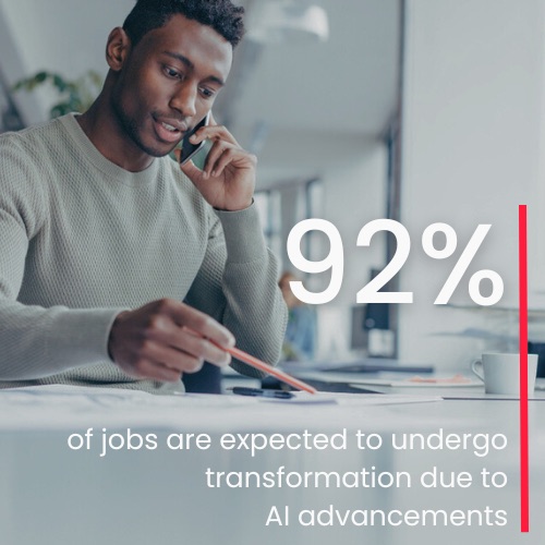 Young professional man holding a pencil works at a desk with text overlay: 92% of jobs are expected to undergo transformation due to AI advancements