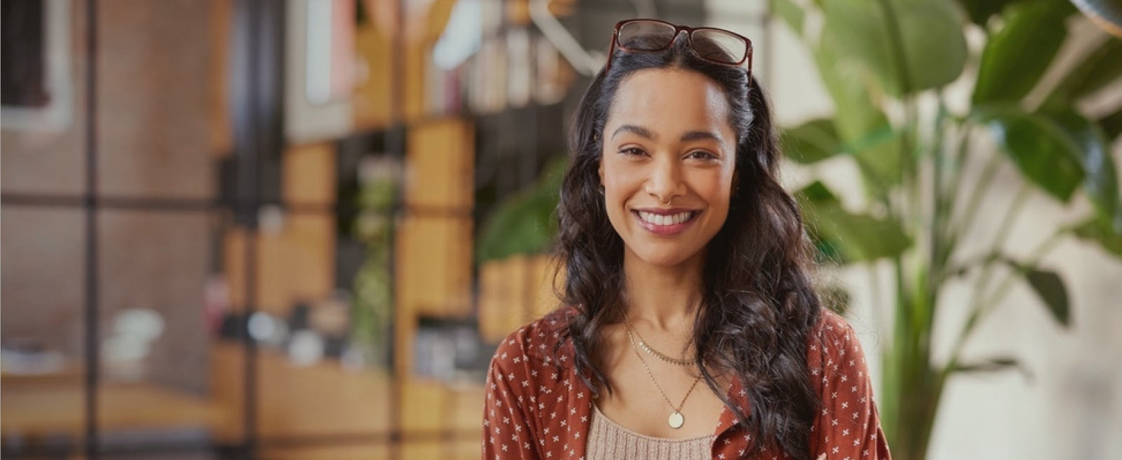 Woman smiling with arms crossed