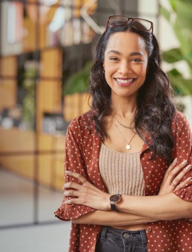 Woman smiling with arms crossed