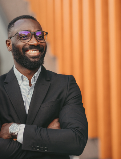 Smiling man in suit and glases