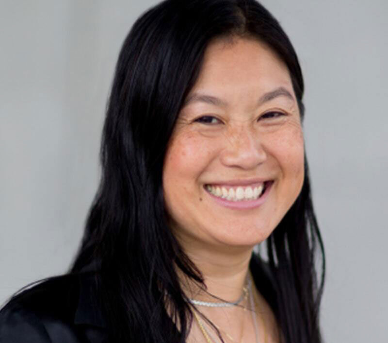 headshot of Lili Cheng on grey background