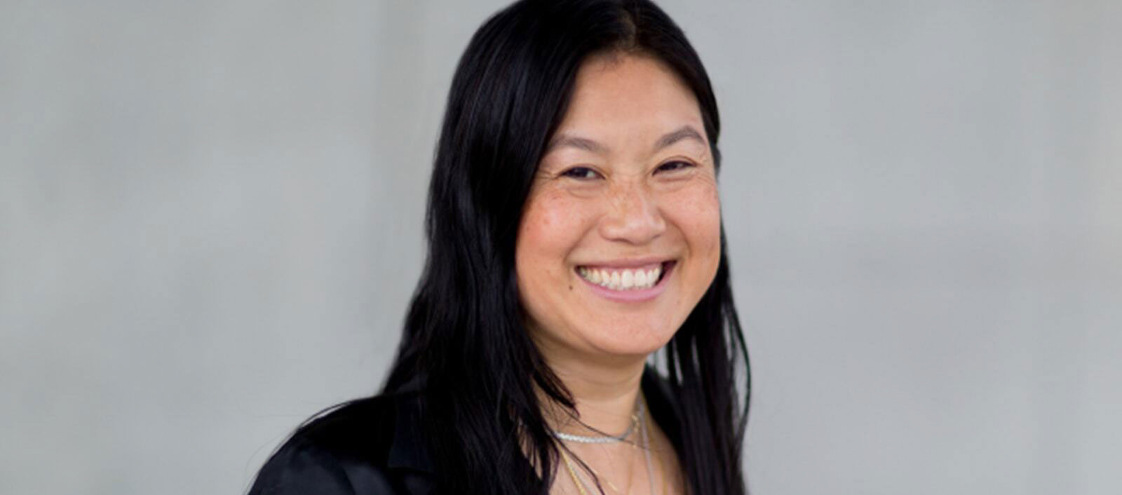 headshot of Lili Cheng on grey background