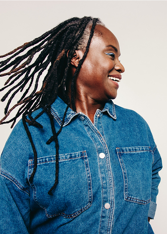 smiling woman looking to the right