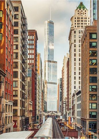 city skyscraper with train